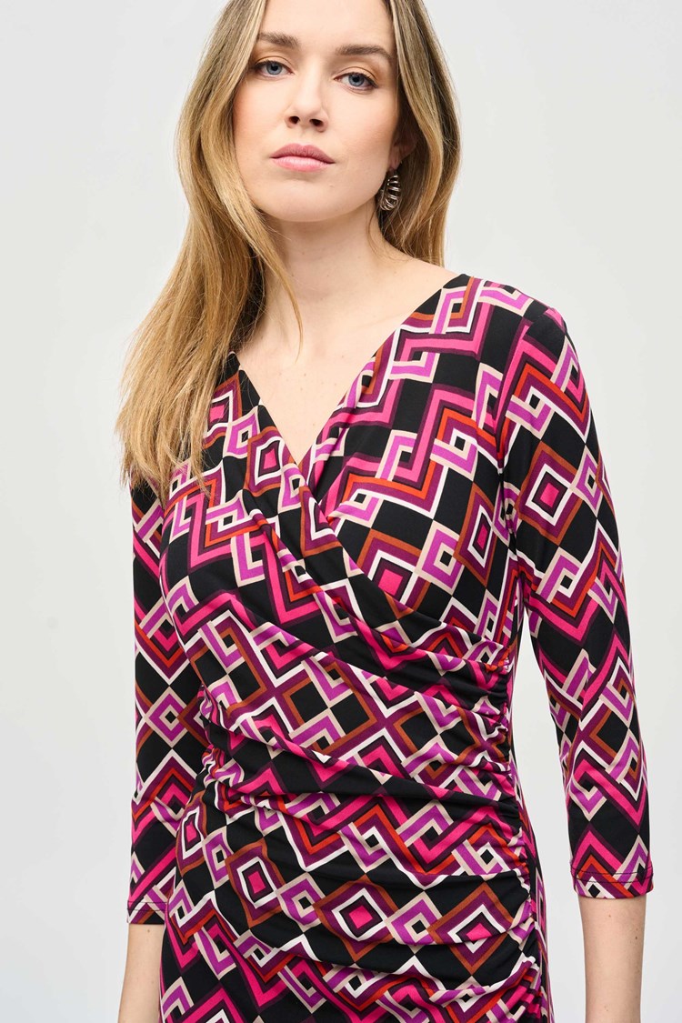 Silky knit geometric print wrap dress