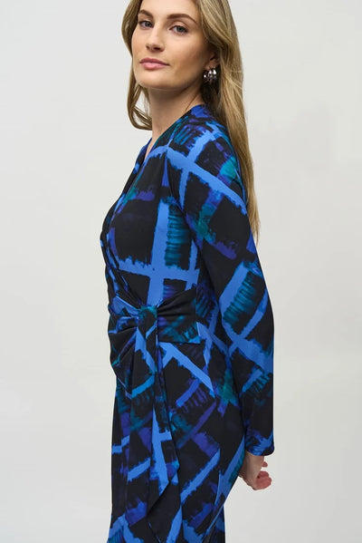 Silky knit abstract print wrap dress