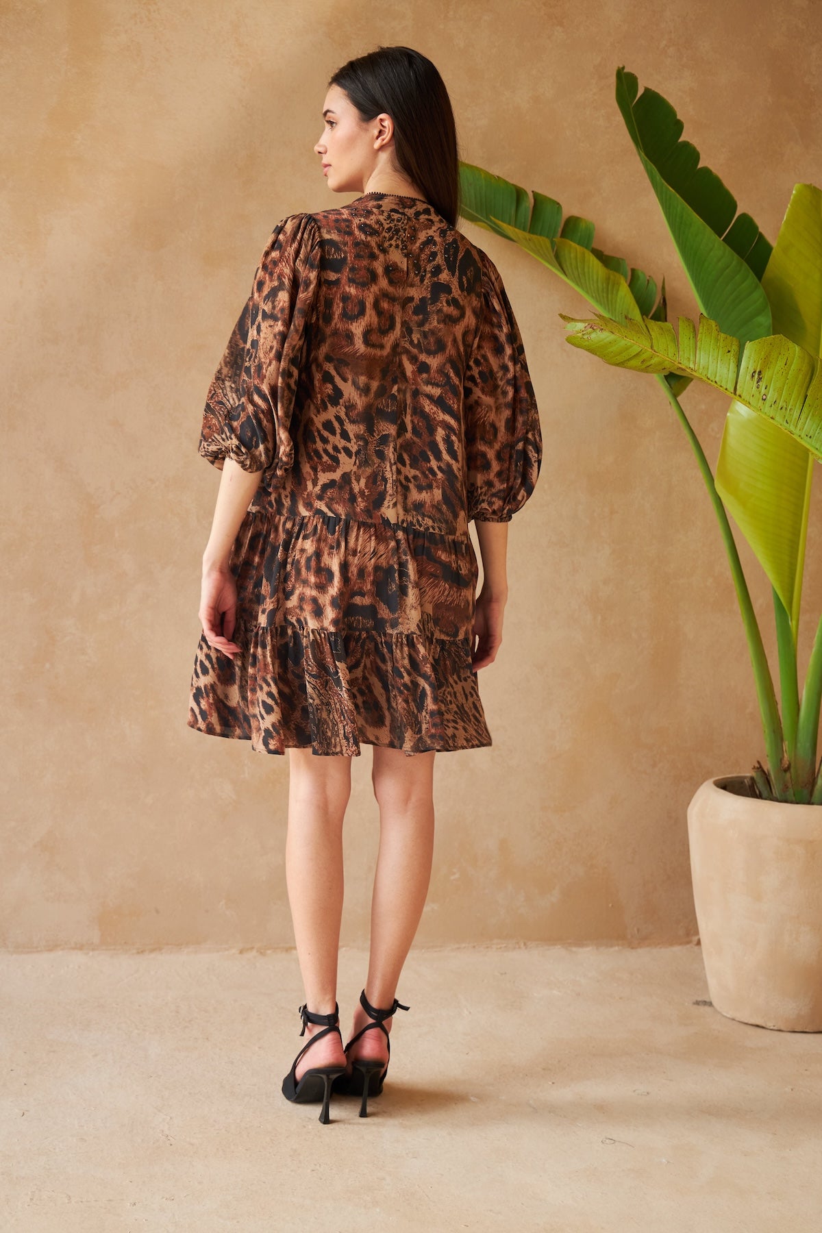 Biennials dress in panther brown